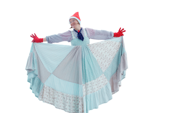 Happy woman dancing in blue dress and santa hat on christmas, isolated on white background