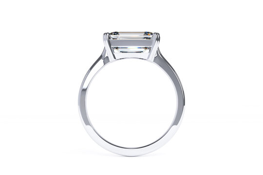 Diamond solitaire engagement ring with an emerald cut stone on white background. 3d rendering