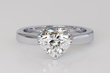 Diamond solitaire engagement ring with a heart cut stone on white background. 3d rendering