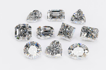 Ten loose diamonds of multiple cut styles lined up on white background. 3d illustration