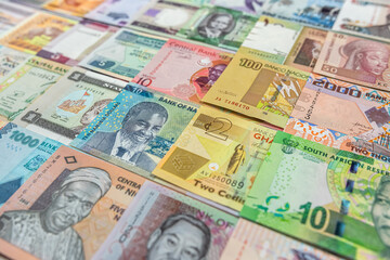 Fototapeta na wymiar Background with folded banknotes for payment from Africa from top to bottom.