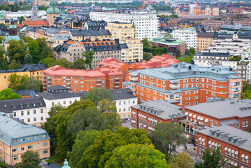 Fototapeta na wymiar Beautiful aerial view on the buildings roofs of Stockholm city center. Travel destinations.