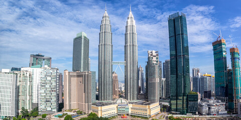 Fototapeta na wymiar Petronas Twin Towers skyscrapers KLCC skyline panorama in Kuala Lumpur Malaysia