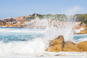 waves crashing on rocks