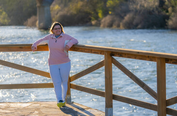 thoughtful beautiful woman walk a river copy space for promotional content