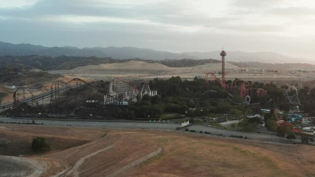 Six Flags Magic Mountain Santa Clarita Drone Aerial Circling Right Sunset