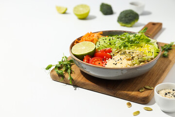 Bowl with tasty and nutritious food, space for text