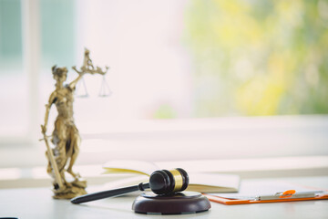 The statue of justice  IUSTITIA Justitia, the goddess of Roman justice in the lawyer office 
Law justice courtroom concept constitution judge court