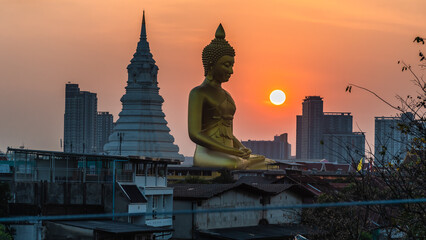 Fototapeta premium landscape of big buddha in the city large Buddha statue in Bangkok Wat Pak Nam Phasi Charoe Thailand