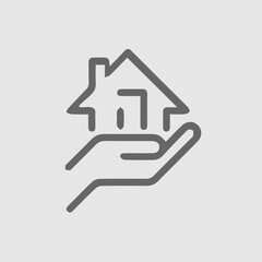 House in hand vector icon. Real estate symbol. Vector illustration EPS 10.
