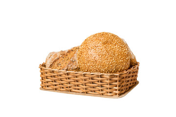 Freshly baked bread on basket isolated on white background. Perspective view bread copy space