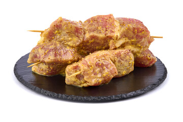 Raw pork skewers, ready to cook, kebab BBQ, isolated on white background.