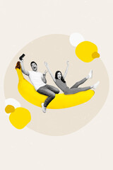 Creative artwork collage of two mini excited black white gamma people sit huge banana fruit use...