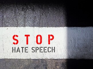 Black and white walkway with text STOP HATE SPEECH , concept of banning hate speech, no more spread...