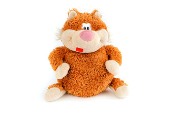 Ginger funny cat stuffed toy on a white background.