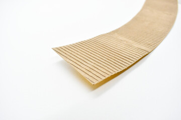 closeup brown paper cardboard texture on white background