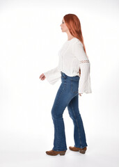 full length portrait of beautiful woman model with long red hair, wearing casual outfit white...