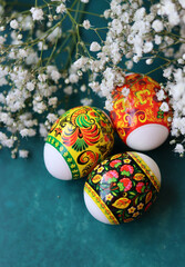 Still life with Easter eggs. Top view photo of colorful eggs on a table. Easter holidays concept. 