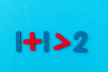 One plus one more than two
