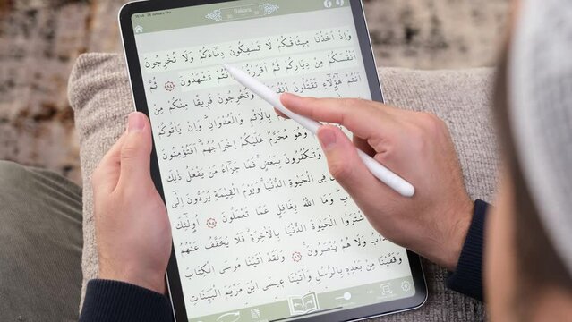 person reading Quran