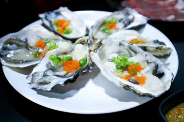 oyster , shell or raw oyster with shrimp egg