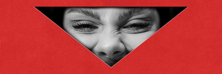 Grimacing face. Black and white part of female face in red background. Funny meme emotions. Contemporary art collage. Conceptual design. Concept of creativity, abstract art, imagination, inspiration.