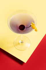 Classic aviation cocktail on red and yellow background