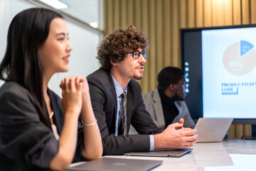 Group of business meeting and discussing strategy with startup project analysis finance process.Success business people plan and brainstorm marketing idea with document in office.Teamwork