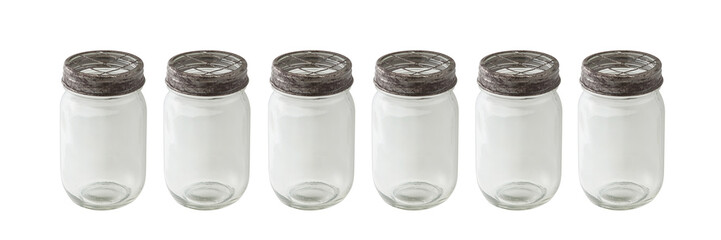 row of glass jars with wire mesh caps. isolated white background