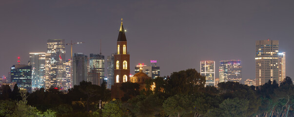 Fototapeta na wymiar Tel Aviv: Russian Orthodox church and modern skyscrapers at night