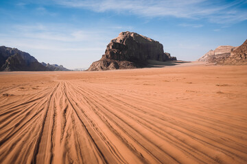 Tyre tracks in the sand in the Wadi Rum desert, UNESCO World Heritage Site, Jordan