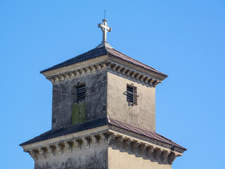 Fototapeta na wymiar Minaret church with a cross