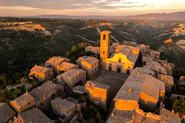 View of the historic centre of the medieval village of Civita di Bagnoregio at sunset, Viterbo province, Latium (Lazio).