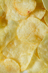 Macro Potato Snacks,Crispy potato chips texture background top view,abstract background of potato chips food texture 