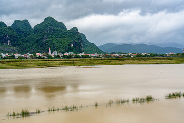 Obraz na płótnie Canvas Northern Vietnam, landscape on a rainy day in the in the national park of Phong Nha-Kẻ Bàng. Unesco Global Geopark