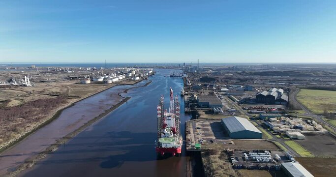 River Tees jack up vessels on berth offshore wind support, Leviathan and Seajacks Hydra - March 2023 - Aerial drone prores footage pull back - clip 3