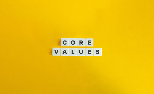 Core values concept. Block letters on orange yellow background.