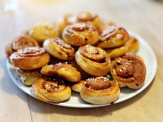 Cinnamon buns as a pastry or snack on a plate