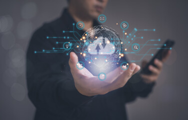 Concept of using cloud computing to store data : Business man holding are using cloud computing to...