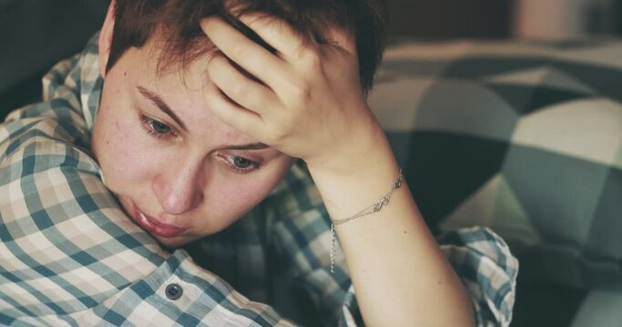 Woman crying portrait. Sad person with anxiety in stress, desperation, burnout, grief or depression experiencing severe mental breakdown. Emotional health problem..