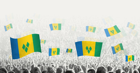 Abstract crowd with flag of Saint Vincent and the Grenadines. Peoples protest, revolution, strike and demonstration with flag of Saint Vincent and the Grenadines.