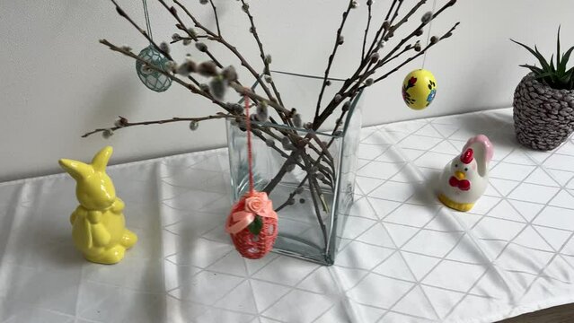 traditional Easter decoration with painted egg ant catkins