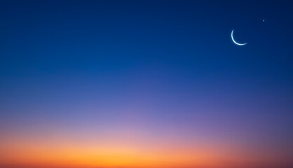 Obraz na płótnie Canvas Crescent Moon and Star on colorful Horizontal Dusk Sky, Beautiful Twilight background with free space for text Ramadan, Eid Al Adha, Mubarak, Eid Al Fitr, Muharram