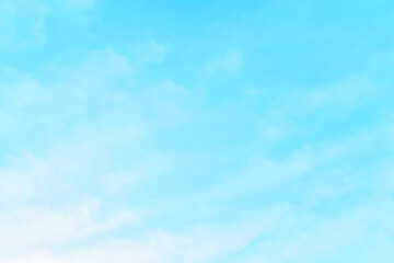 Blue pastel colour sky with white clouds background. 