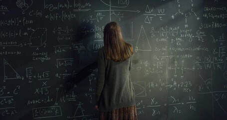 Back View: Woman Writing Mathematics Formulas with Chalk on a Blackboard, Getting Frustrated and Wiping it with Anger. Female Scientist Trying to Solve Equations, Feeling Angry When She Gets Stuck - Powered by Adobe