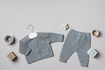Baby stuff and accessories. Knitted clothes - cardigan, pants, shoes, toys and cubes. Baby shower...