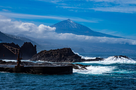 Playa el Pris, Piscina Natural with mount Teide in the background in Baja Negra Canary Islands Spain