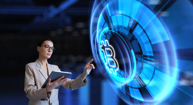 Bitcoin BTC Cryptocurrency exchange investment and trading concept. Young business woman pressing button on virtual screen.