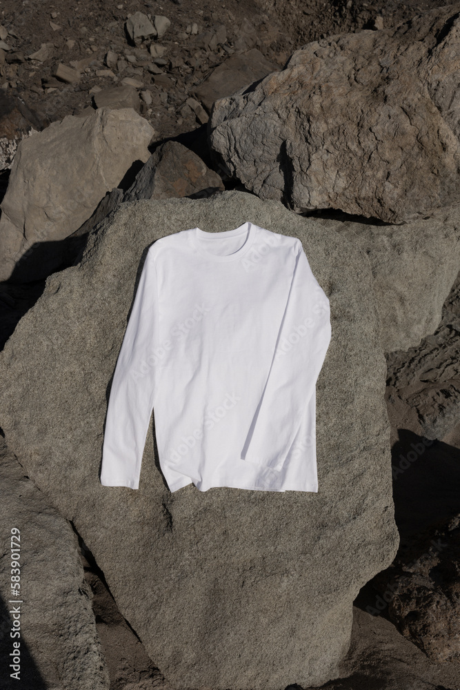 Wall mural MOKITUP: Structured Lifestyle Isolated Long sleeve T-Shirt Mockup on Mountainside and Boulders - Wall murals
