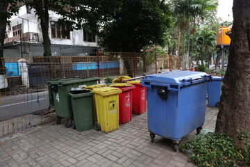Recycle garbage bins with different colors for different types of garbage in the park